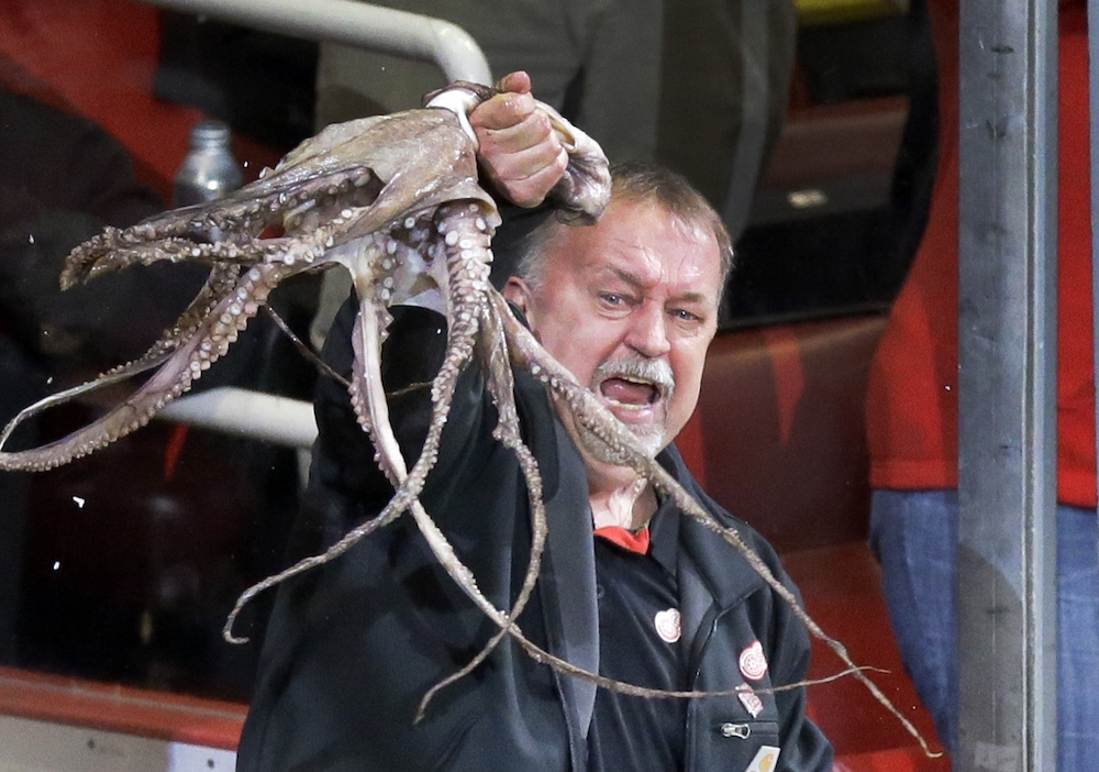 Al the Octopus is lowered down from the scoreboard during Joe