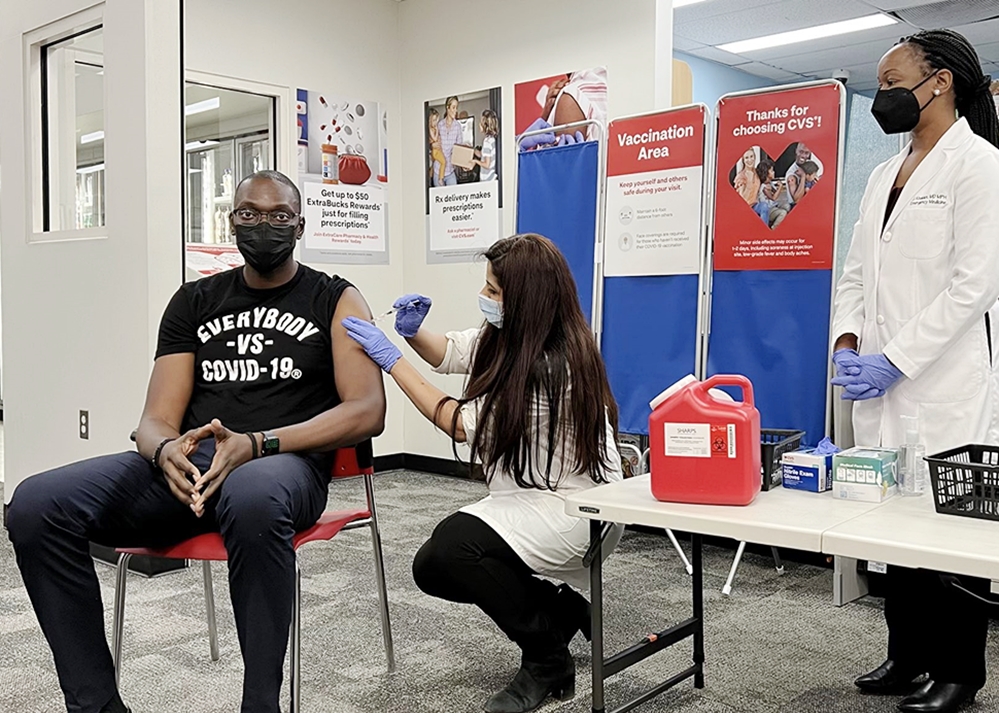 Featured_covid_booster_shot_vax_garlin_gilchrist__nov__21_-_state_photo_51603