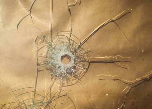 Featured_bullet_hole_wikimedia_commons_attribution_neekoh.fi_50810