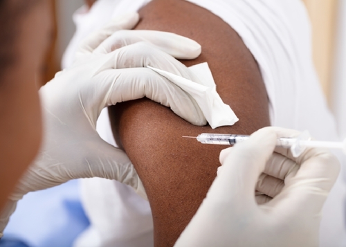 Featured_covid_vaccine__black_patient_-_deposit_photos_46512